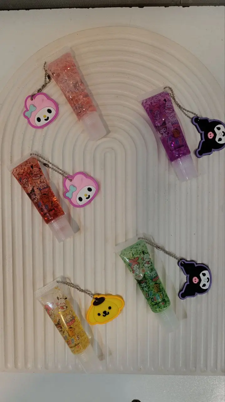 برق لب تیوپی شاین دار همراه با آویز فانتزی